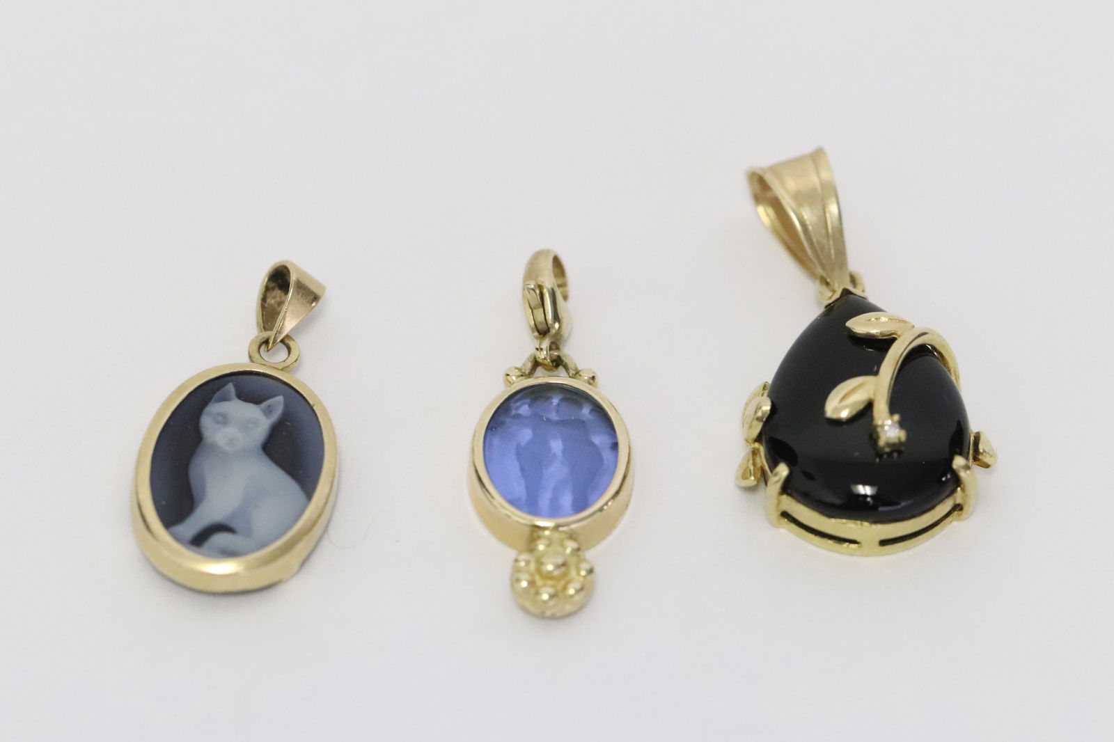 Three 14K Y/G pendants (1 of 10)