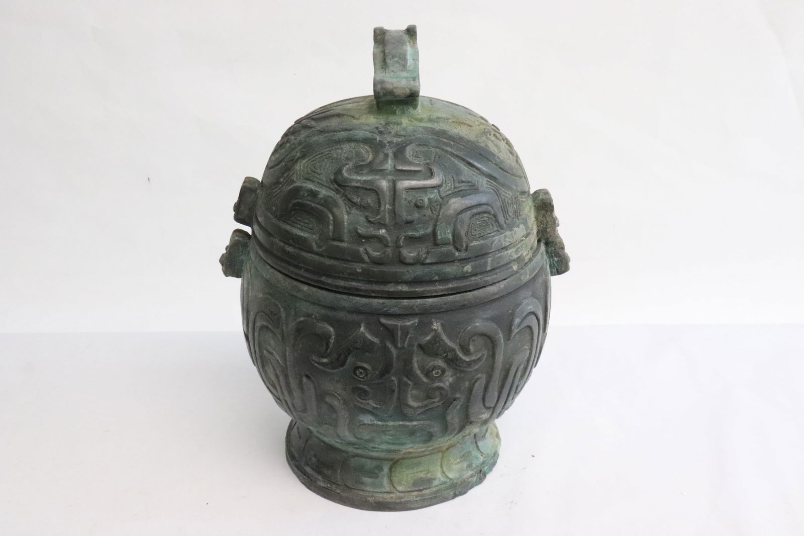 Archaic style bronze covered vessel (1 of 7)