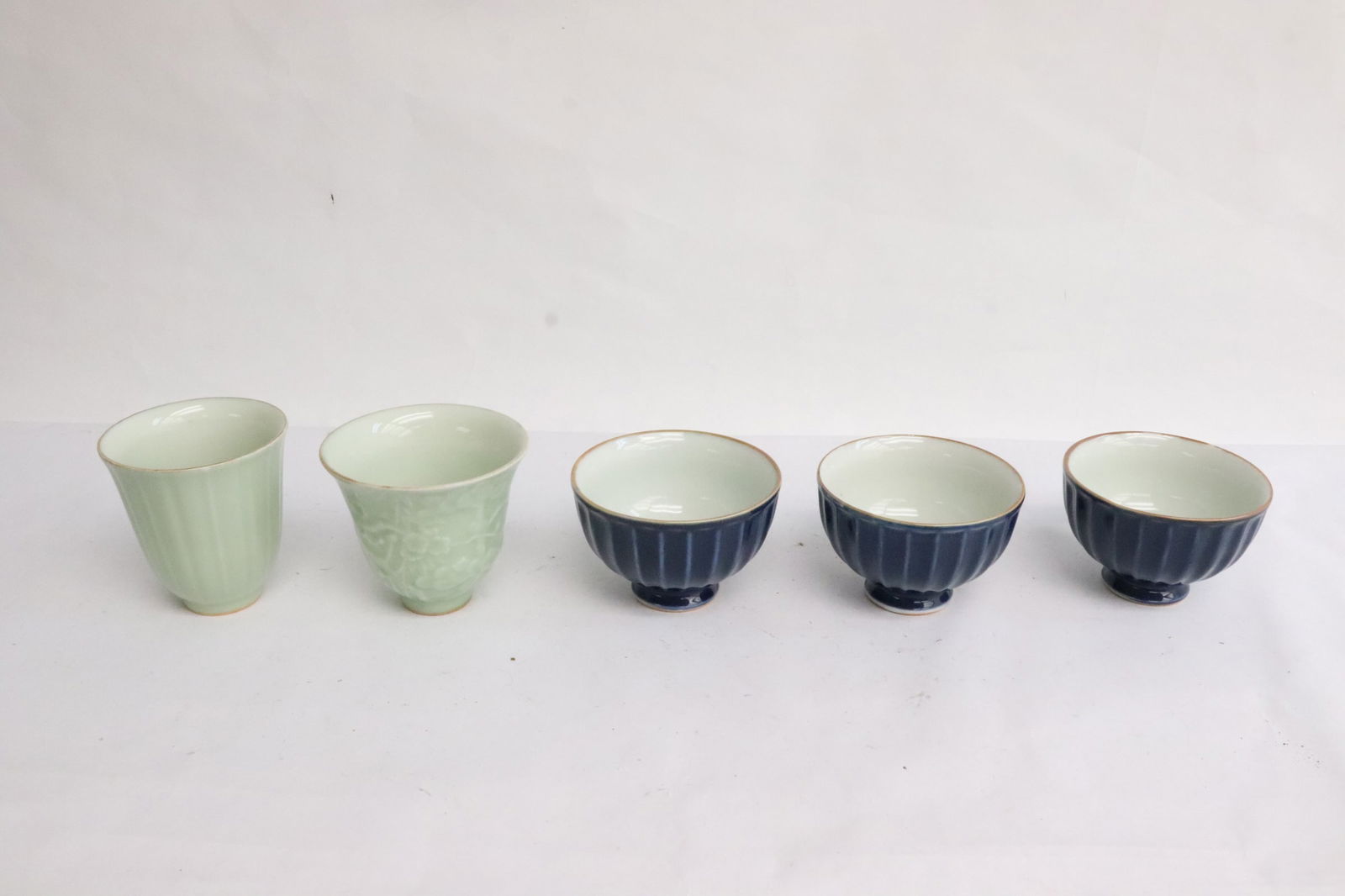 3 blue glazed tea cups and 2 celadon tea cups (1 of 10)