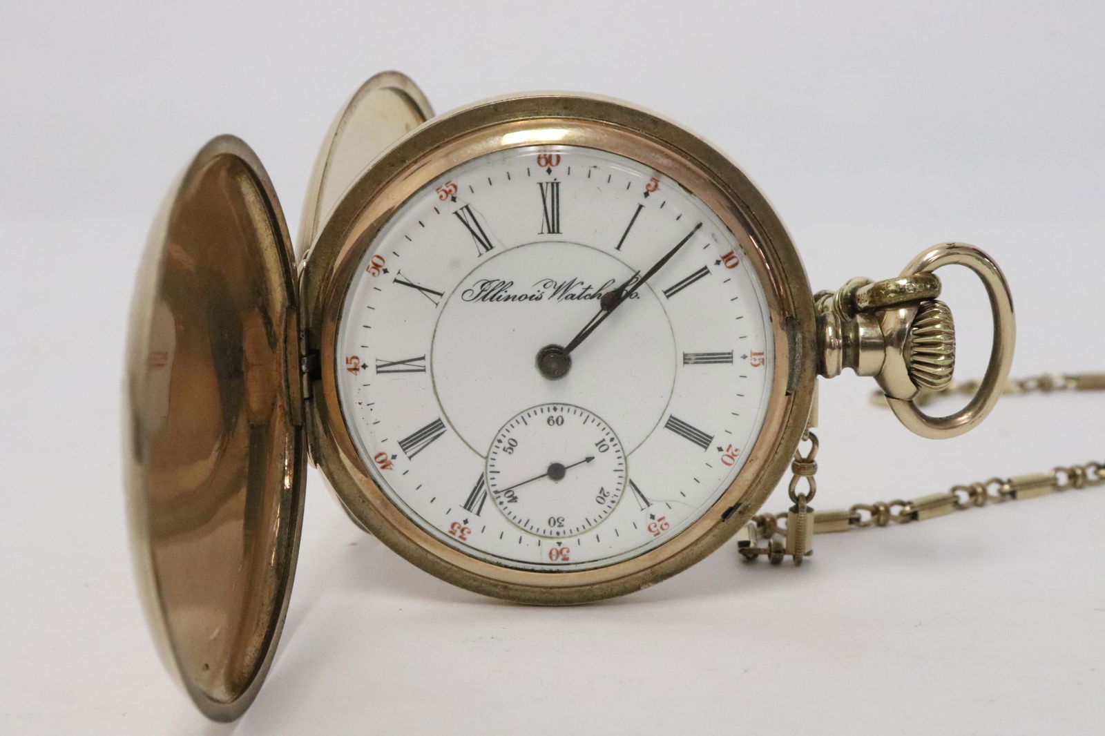 A GF Illinois Waltham pocket watch with watch fob: A gold filled 15-jewel Illinois Waltham hunter case pocket watch with watch fob
