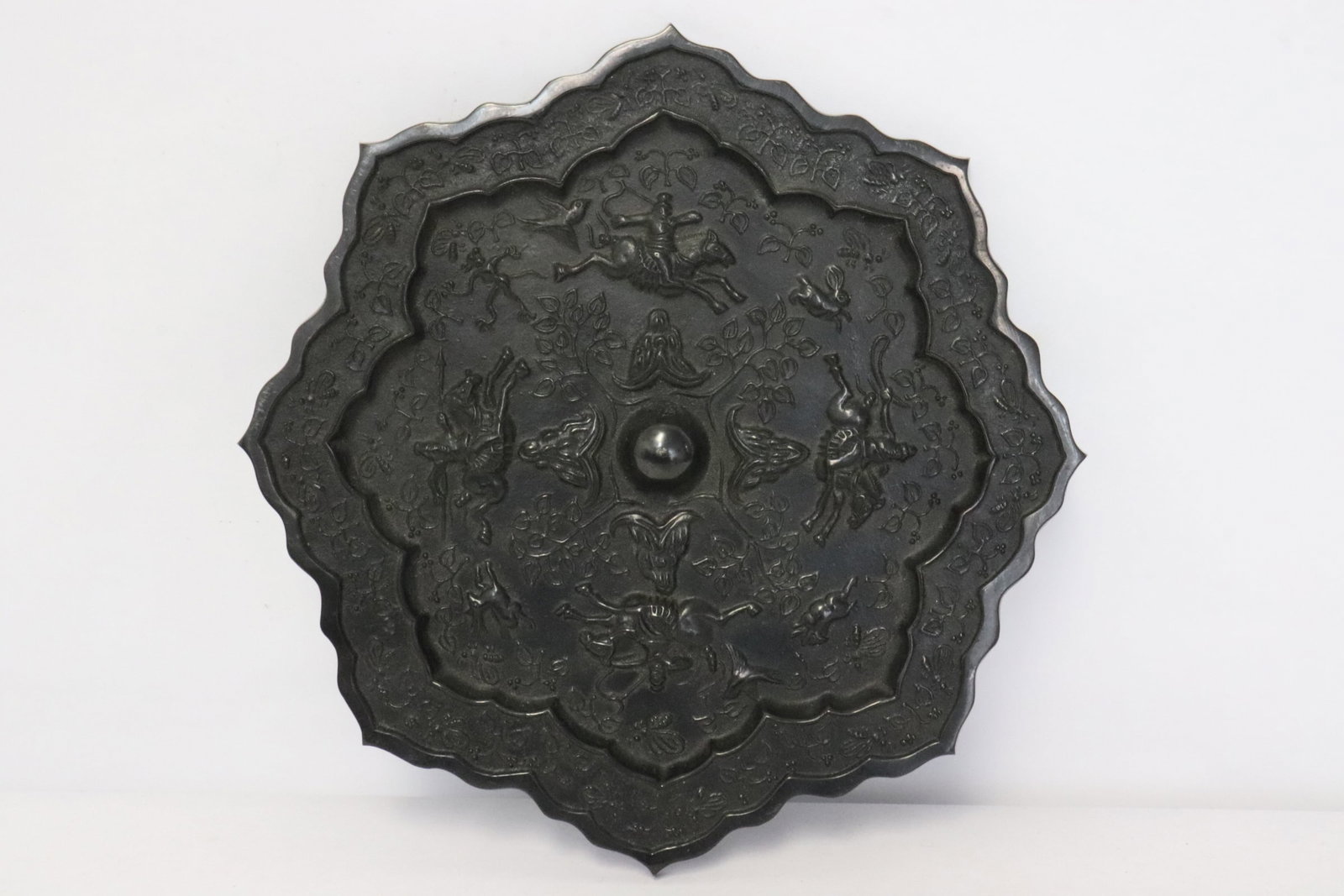 A fine Chinese bronze mirror (1 of 6)