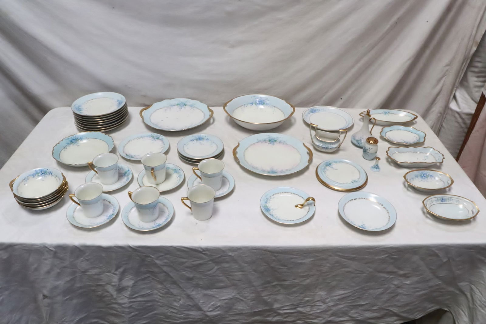 Set of hand painted Bavaria china set: Set of hand painted Bavaria china set; including 8 dinner plates, 6 soup bowls, 6 cups, 5 saucers, 8 various size plates, cruet with stopper, salt and pepper shaker, 2 large serving round plates, larg