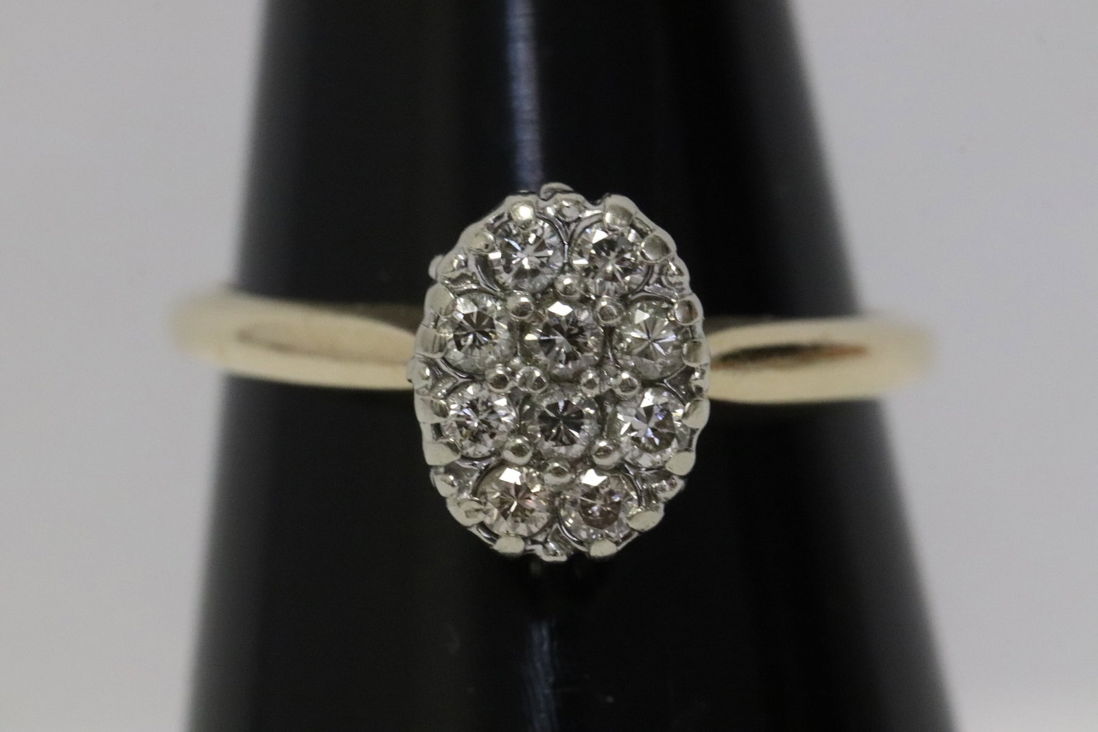 14K Y/G diamond ring: 14K Y/G ring set with 10 brilliant cut diamonds, tdw approx. 0.30ct, wt. 2.2gm, size 5.5