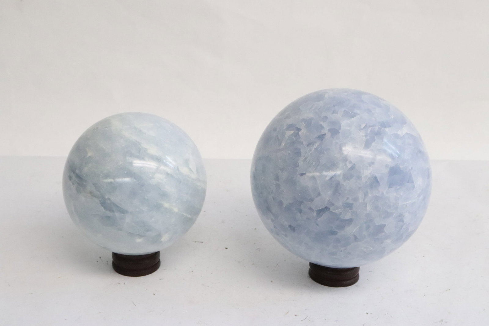 2 aquamarine balls: 2 aquamarine balls, 3.17"x3.17"dia, 3.8"x3.8"dia