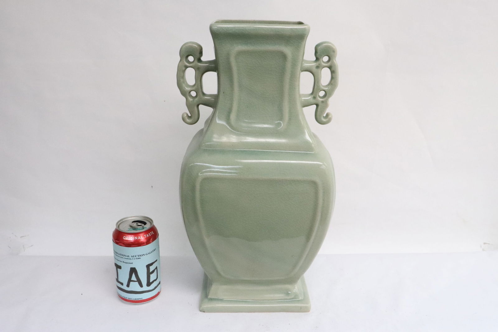 A celadon handled vase: A celadon handled vase, 15.9"x8.7"x6.8"