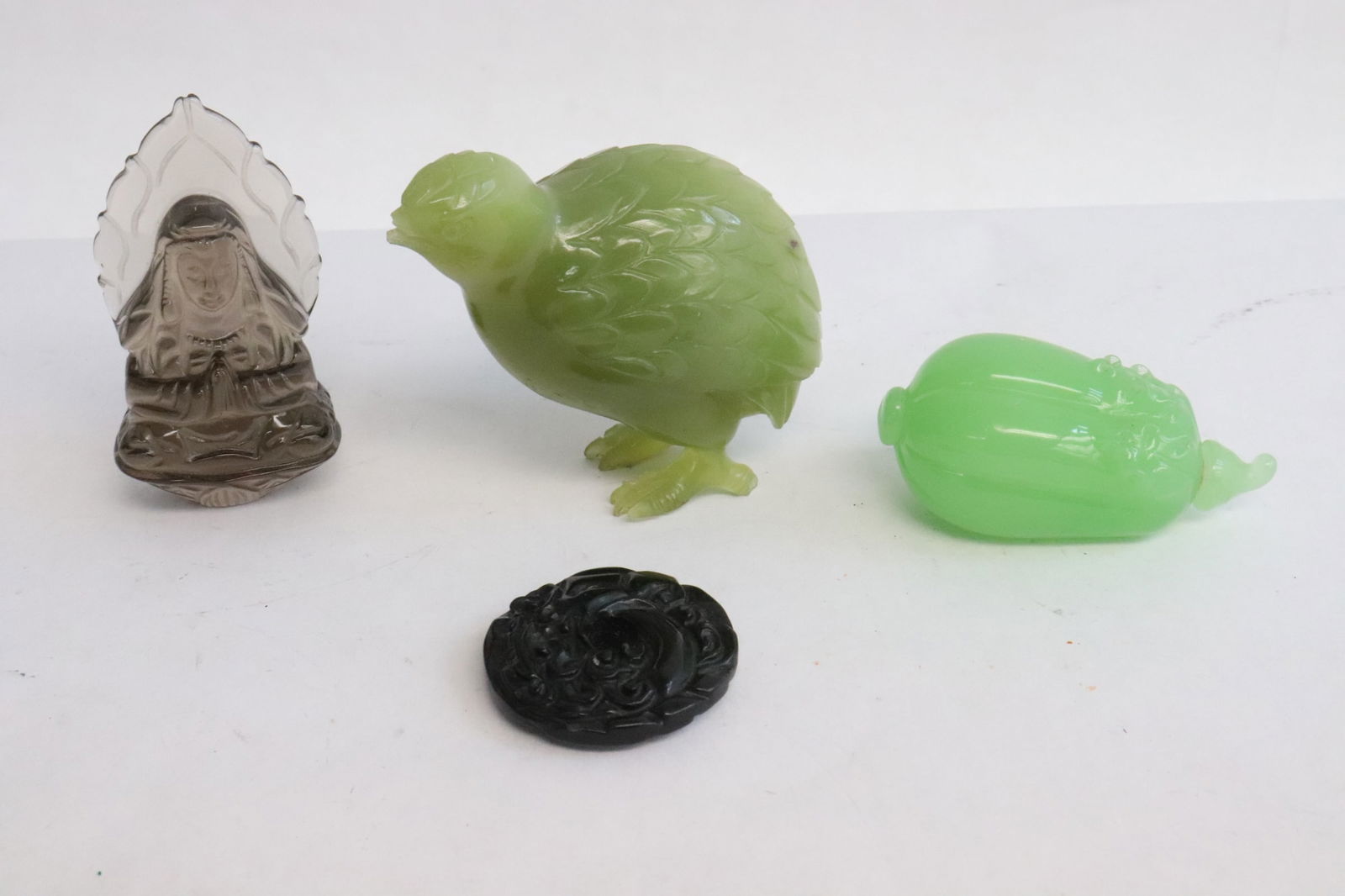 4 pieces: 4 pieces; a celadon jade carved bird (beak chip) (2.75"H), and 3 Peking glass ornaments (0.35"x1.6"dia - 2.8"H)