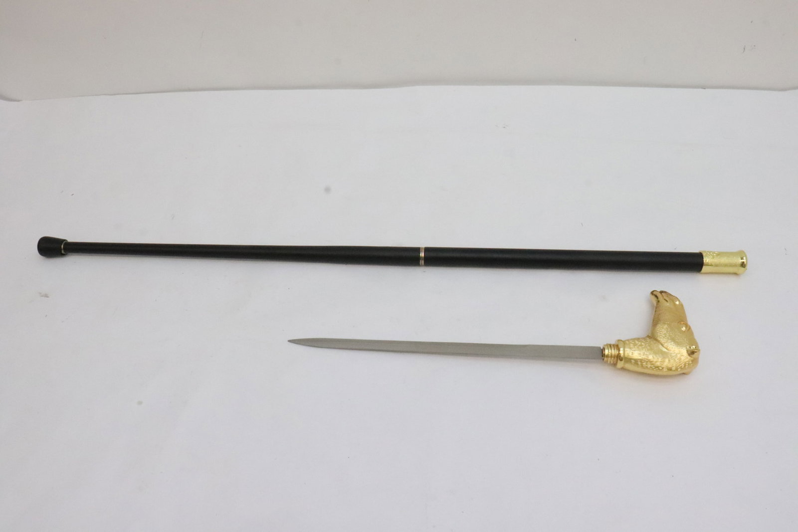 A cane sword: A cane sword, 34.85"L