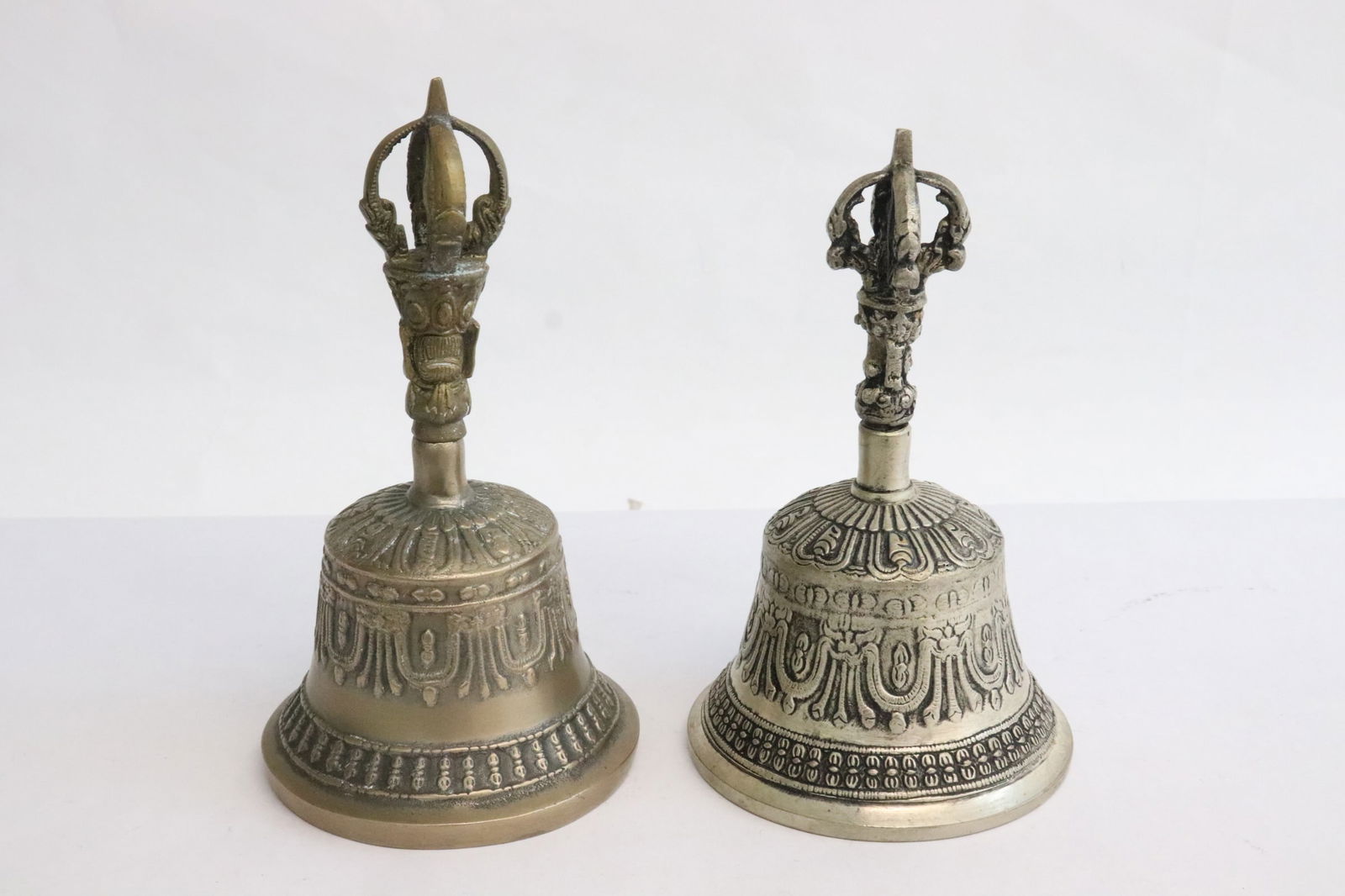2 white metal bells (1 of 10)