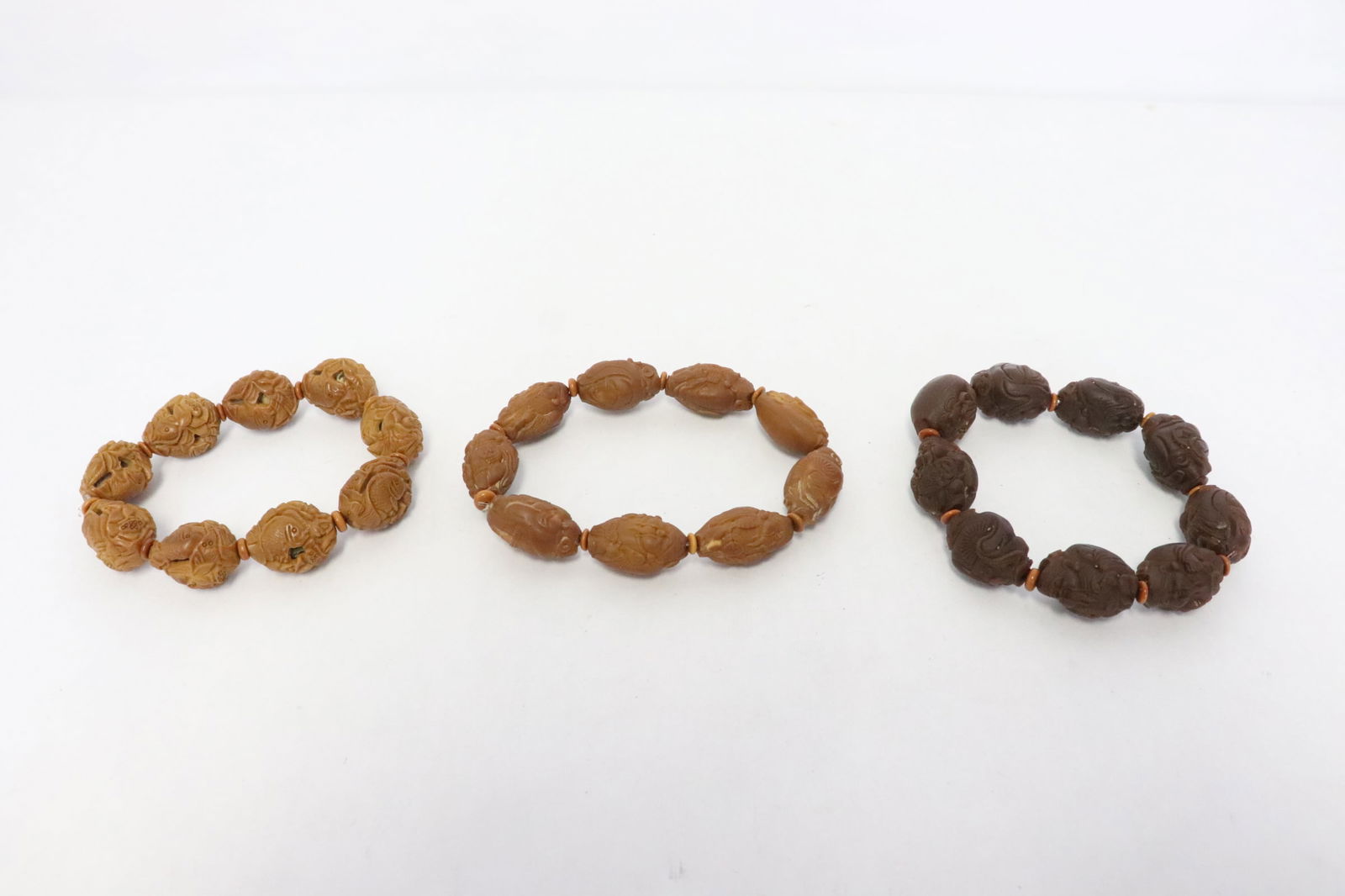 3 possible nut carved bead bracelet (1 of 10)