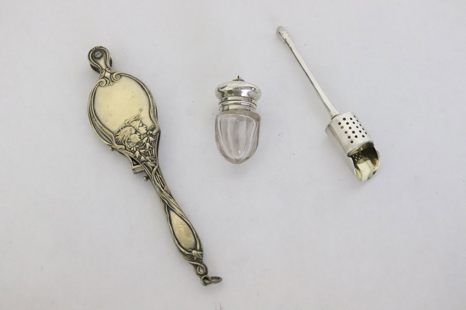 s.p. lorgnette, a miniature shaker, & a silverplate ? (1 of 10)