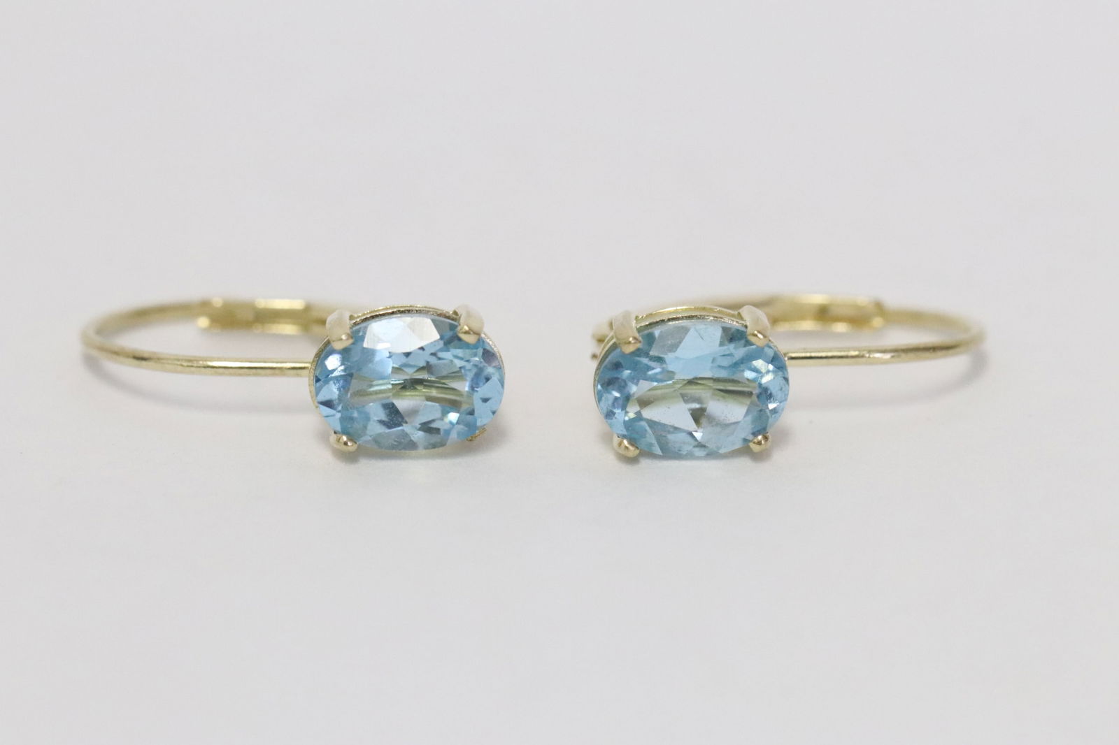 Pair 14K Y/G earrings with blue topaz (1 of 10)