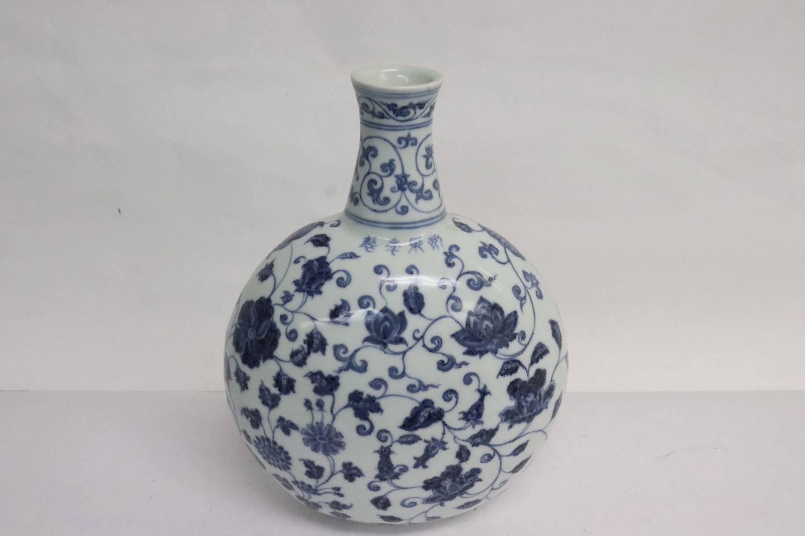 A blue and white porcelain flask: A blue and white porcelain flask, 9.4"x7.15"x4.7"