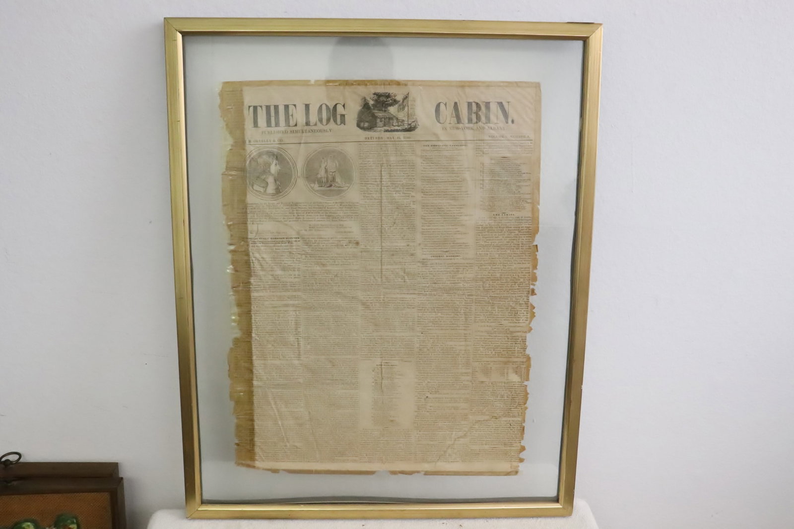 One dated 1840 newspaper with glass frame: One dated 1840 newspaper with glass frame, 19.2"x13.5"