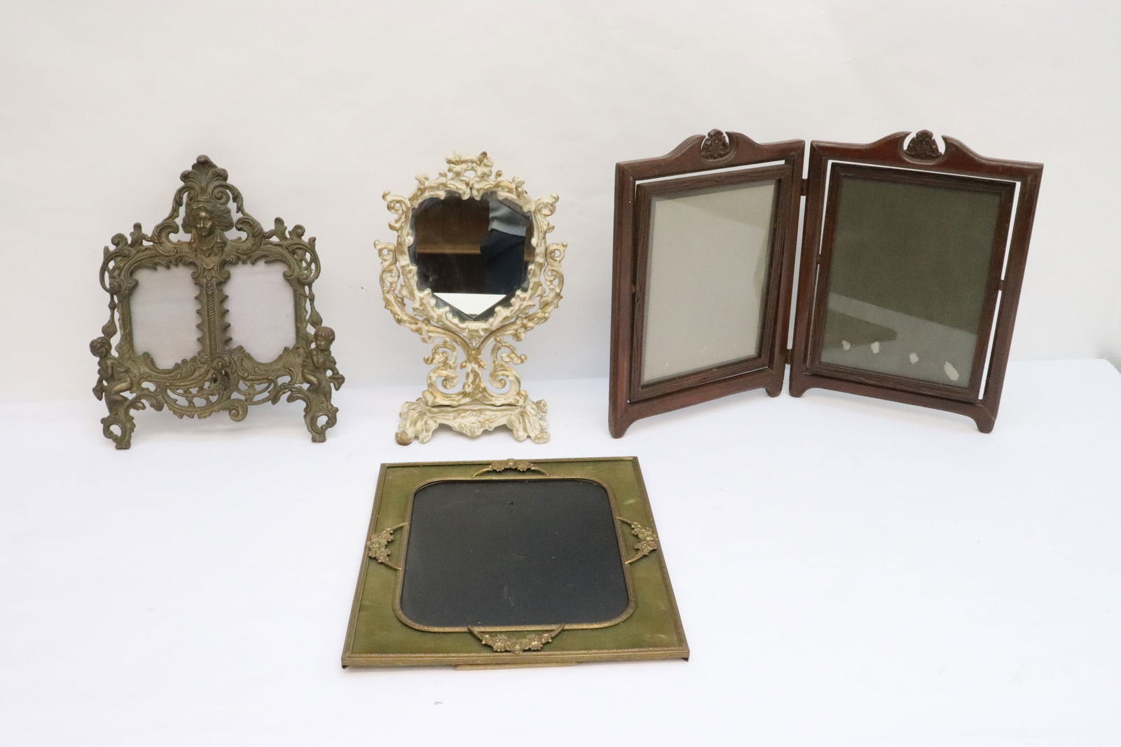 4 pieces cast metal and wood picture frames/ mirror (1 of 9)