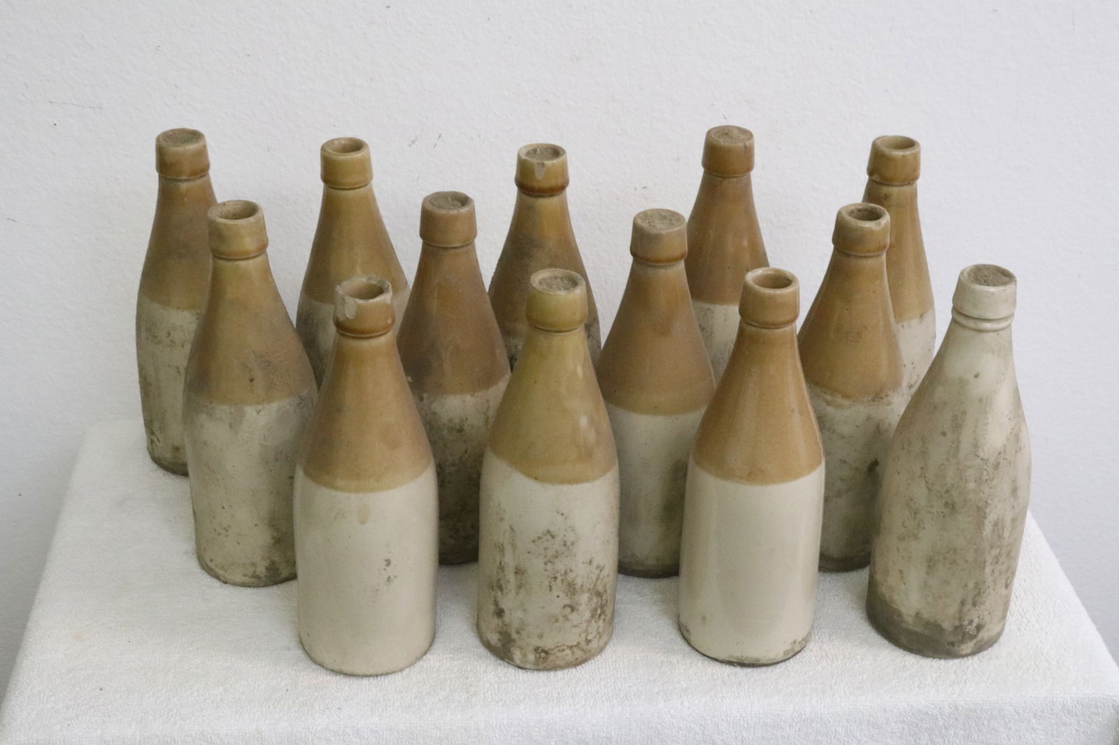 13 antique pottery syrup bottles (1 of 9)