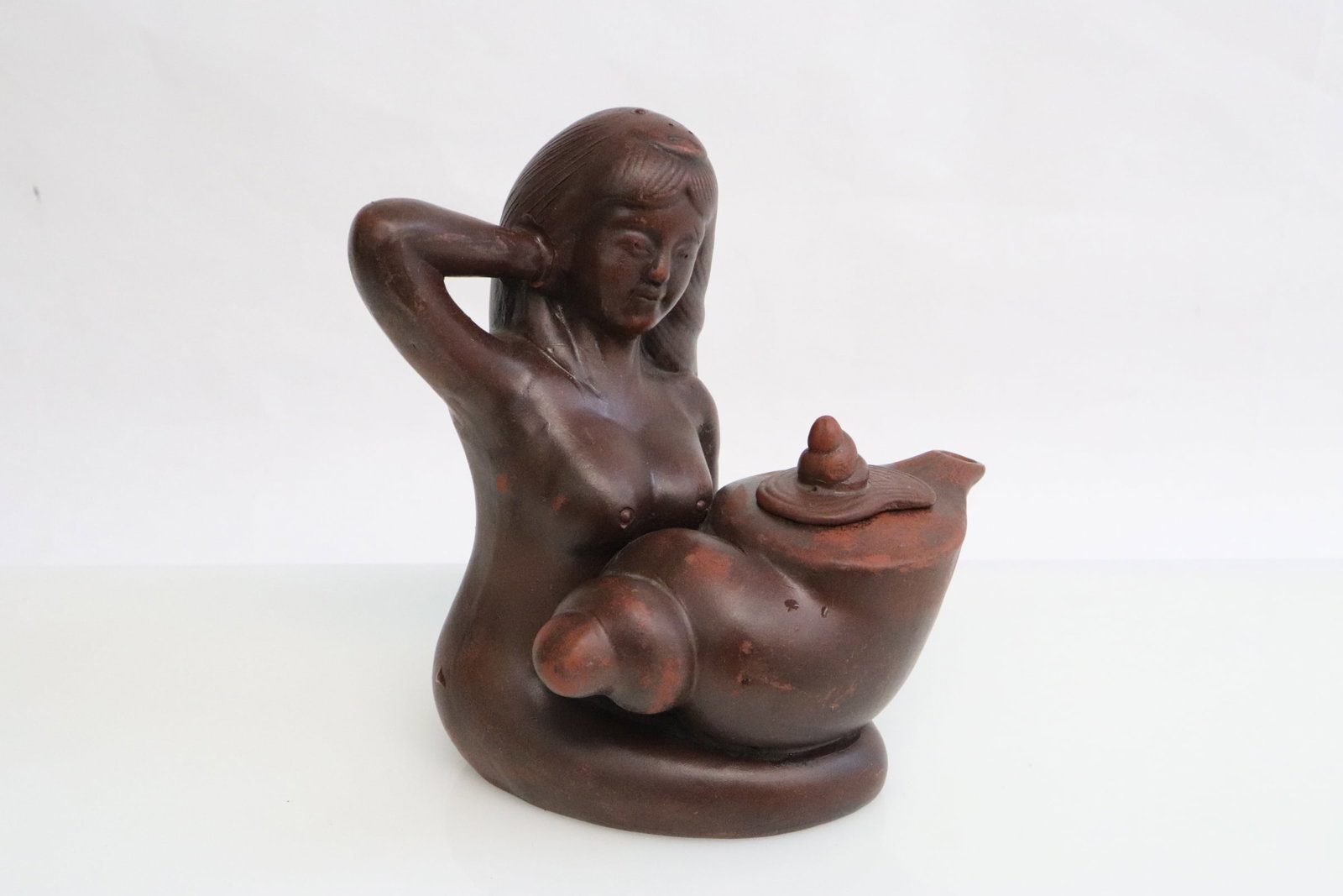 A Yixing teapot: A Yixing teapot, 5.85"x5.15"x4"
