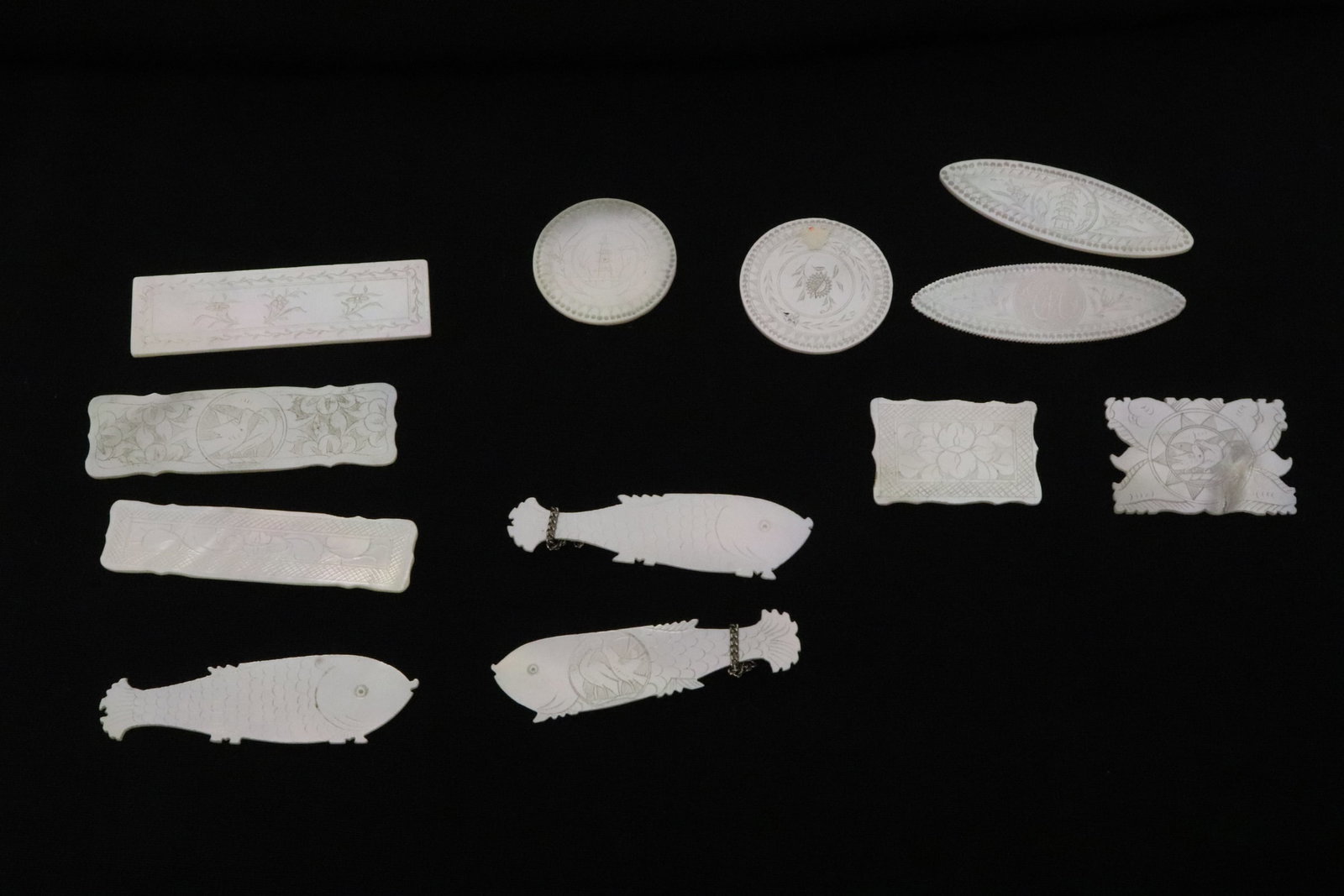 12 Chinese mother of pearl gambling chips(?): 12 Chinese mother of pearl gambling chips(?), 0.02"x1.2"x0.8" - 0.02"x2.22"x0.65"