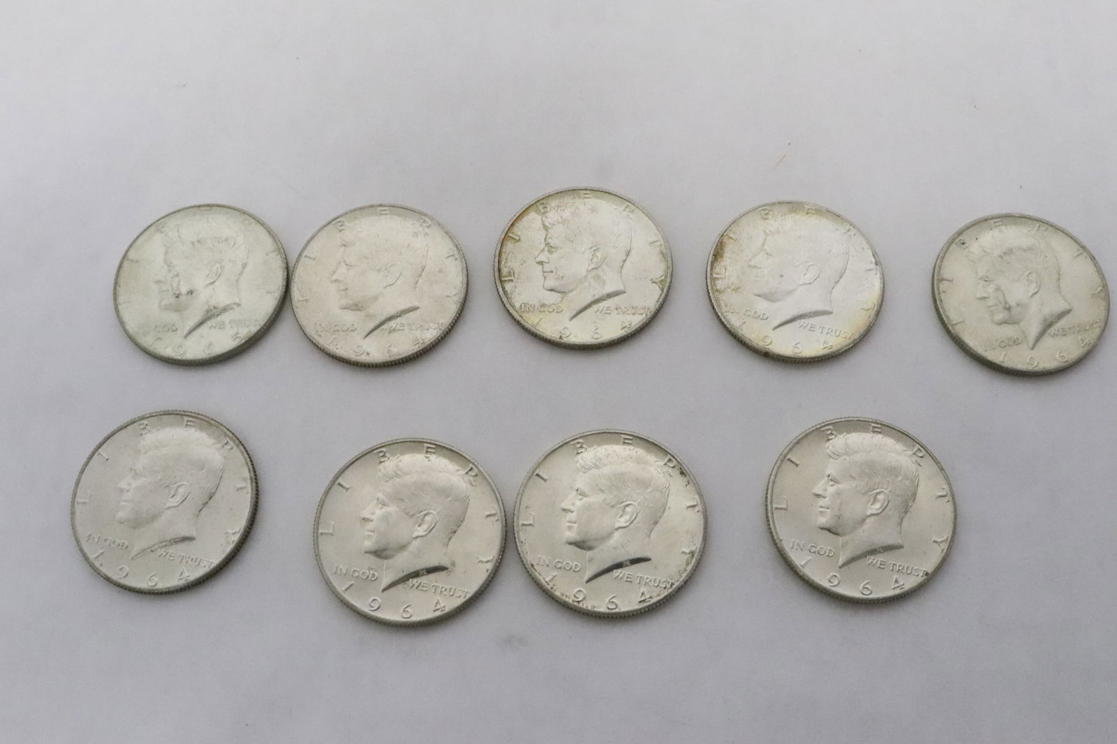 Nine 1964 silver Kennedy half dollars (1 of 8)