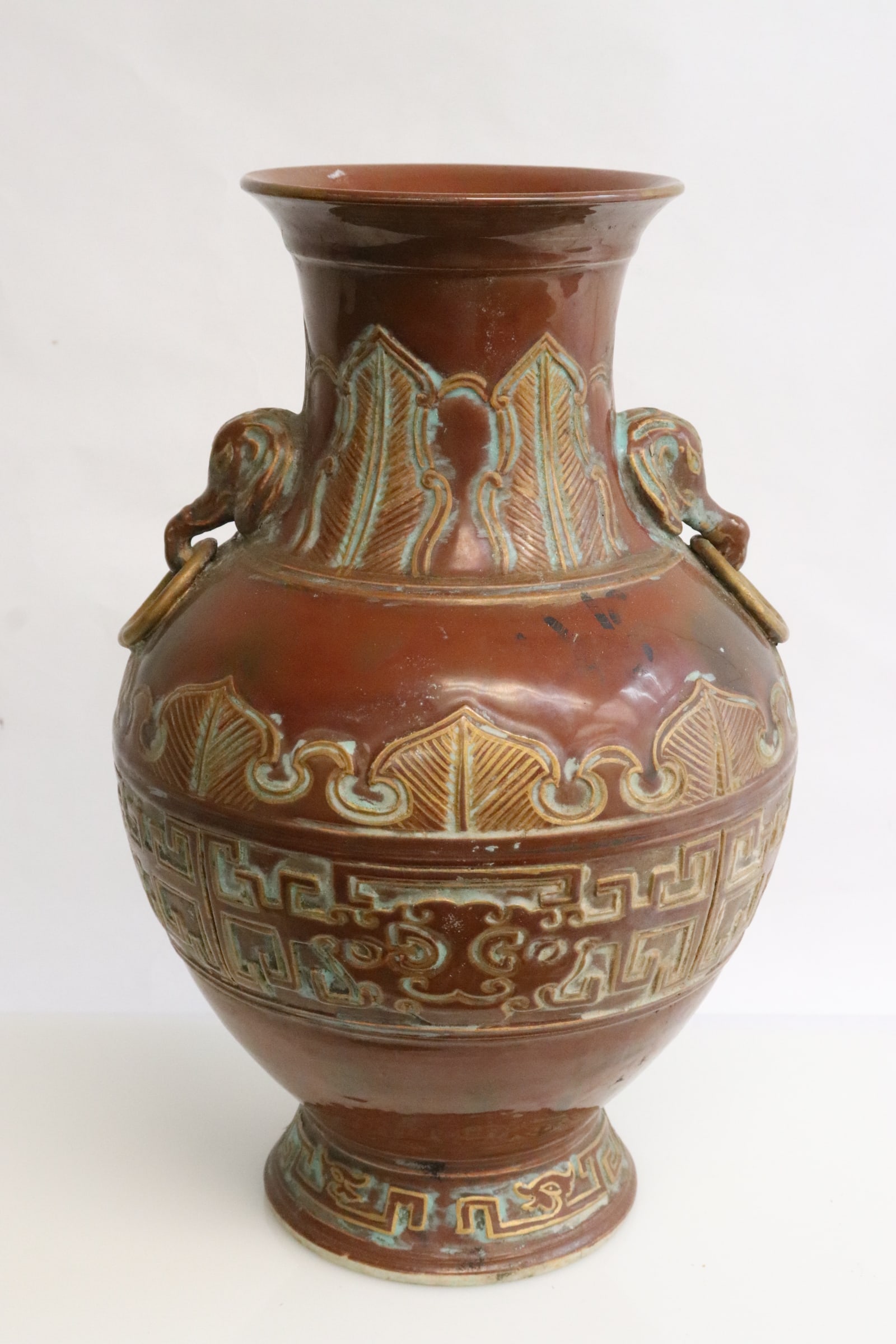 A bronze color large porcelain vase: A bronze color large porcelain vase in archaic style motif, 12.95"x8.4"dia