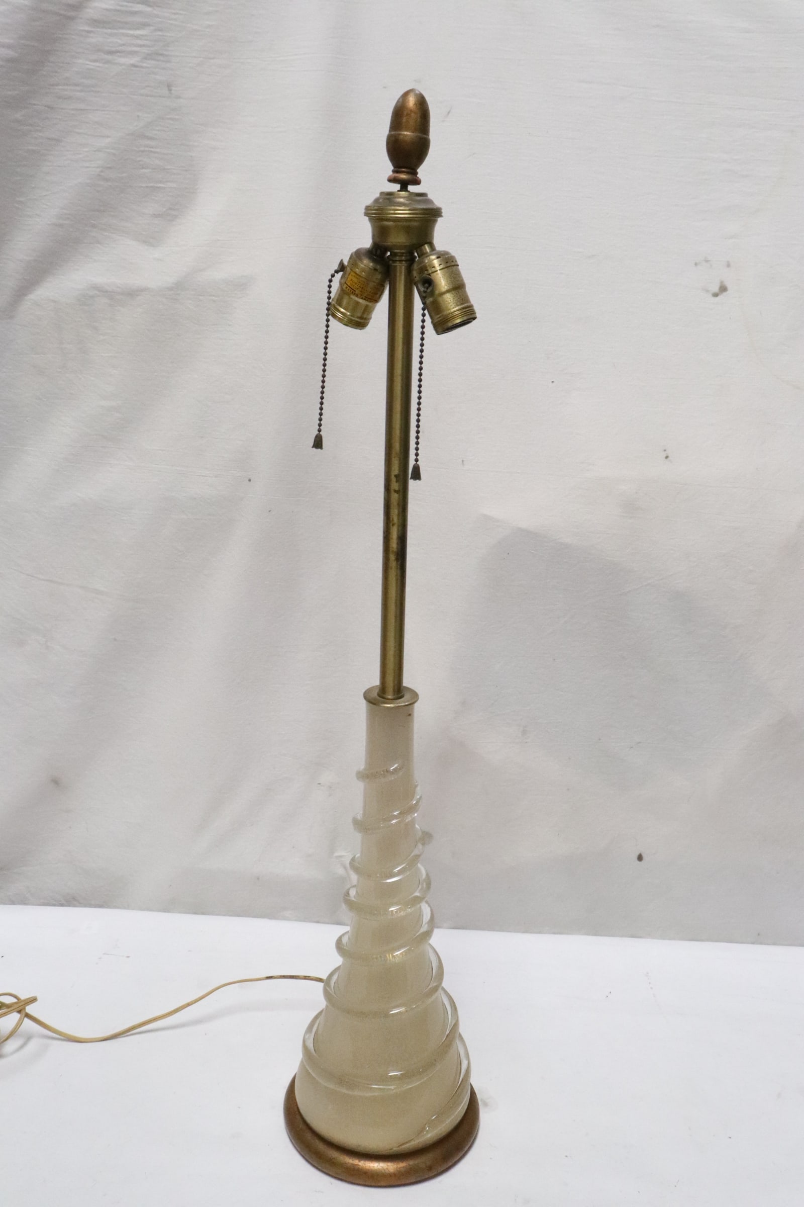 A mid-century art glass based table lamp: A mid-century art glass based table lamp, possible by Murano glass, 34.5"H