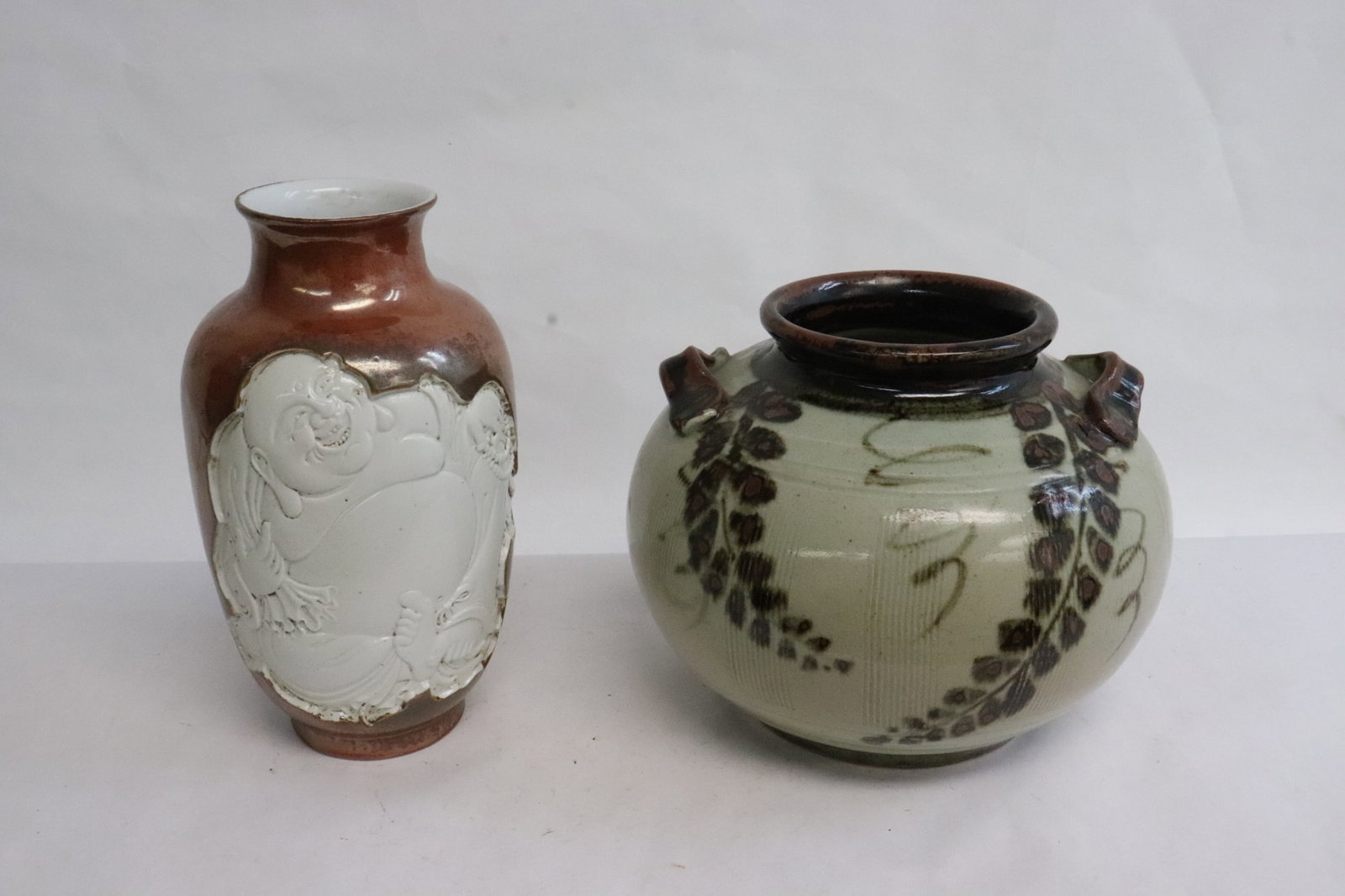 2 brown and white porcelain pieces: 2 pieces; a brown and white porcelain vase (7.9"x4.4"dia), and a brown and white jar (6.2"x8"dia)