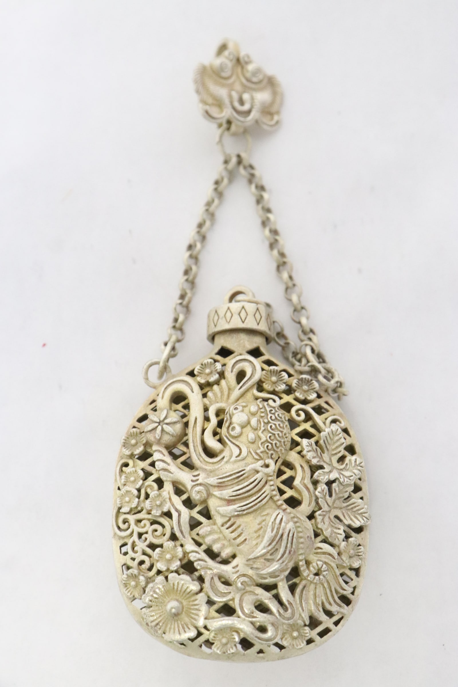 A white bronze scent bottle (1 of 8)