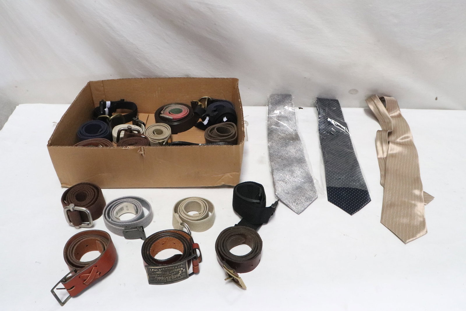 Lot of belts and ties: Lot of belts and ties