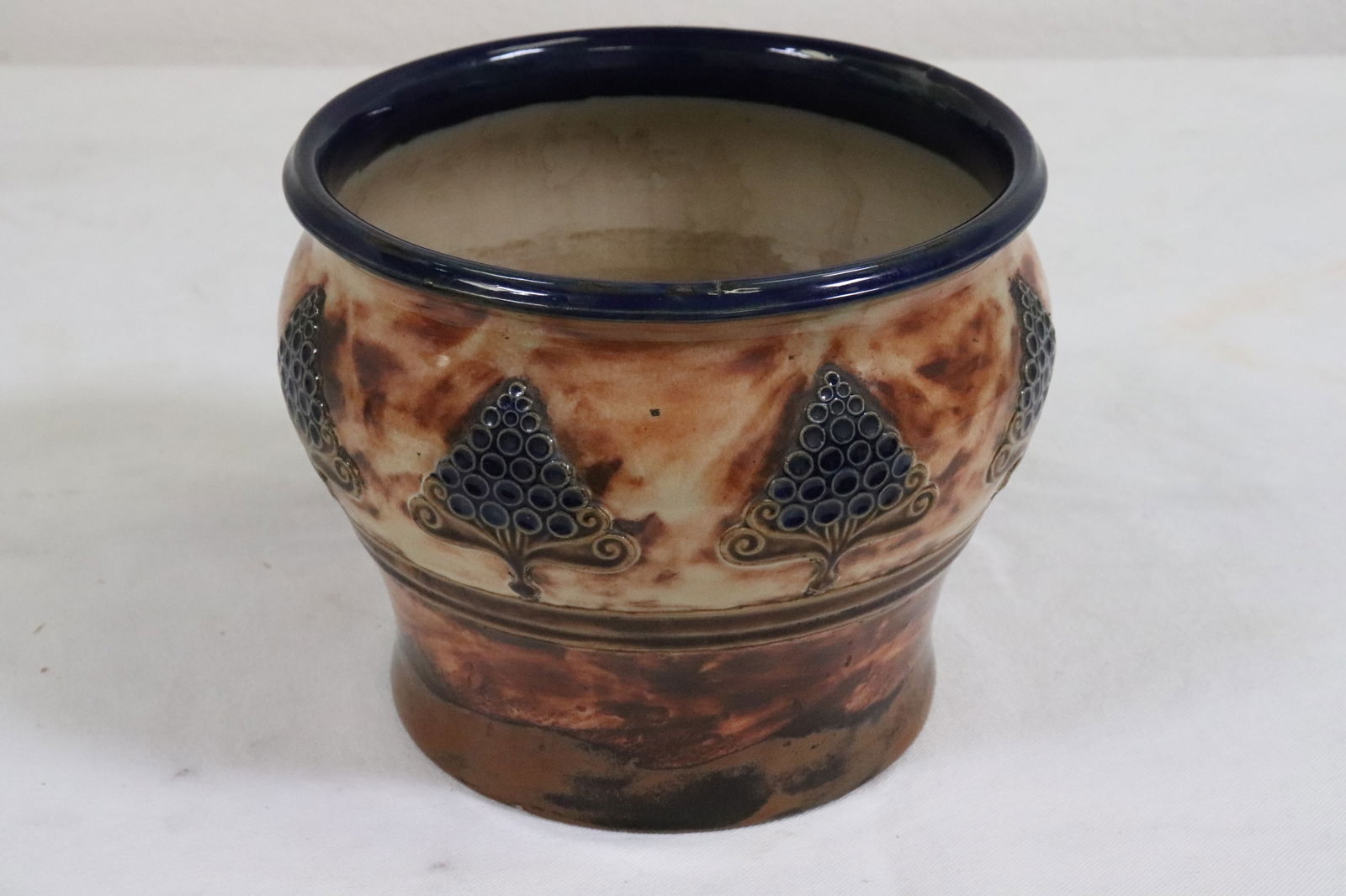 An early English Doulton earthenware planter: An early English Doulton earthenware planter, base edge minor chip, 7.35"x9.4"dia