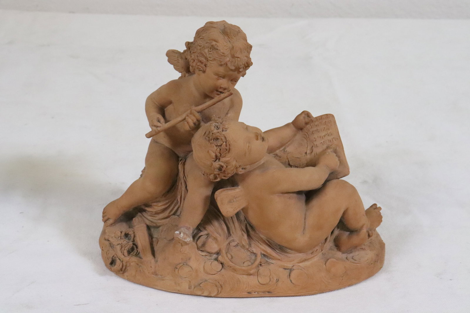 Antique French terracotta sculpture, signed: Antique French terracotta sculpture depicting group of angels, signed, 9.6"H