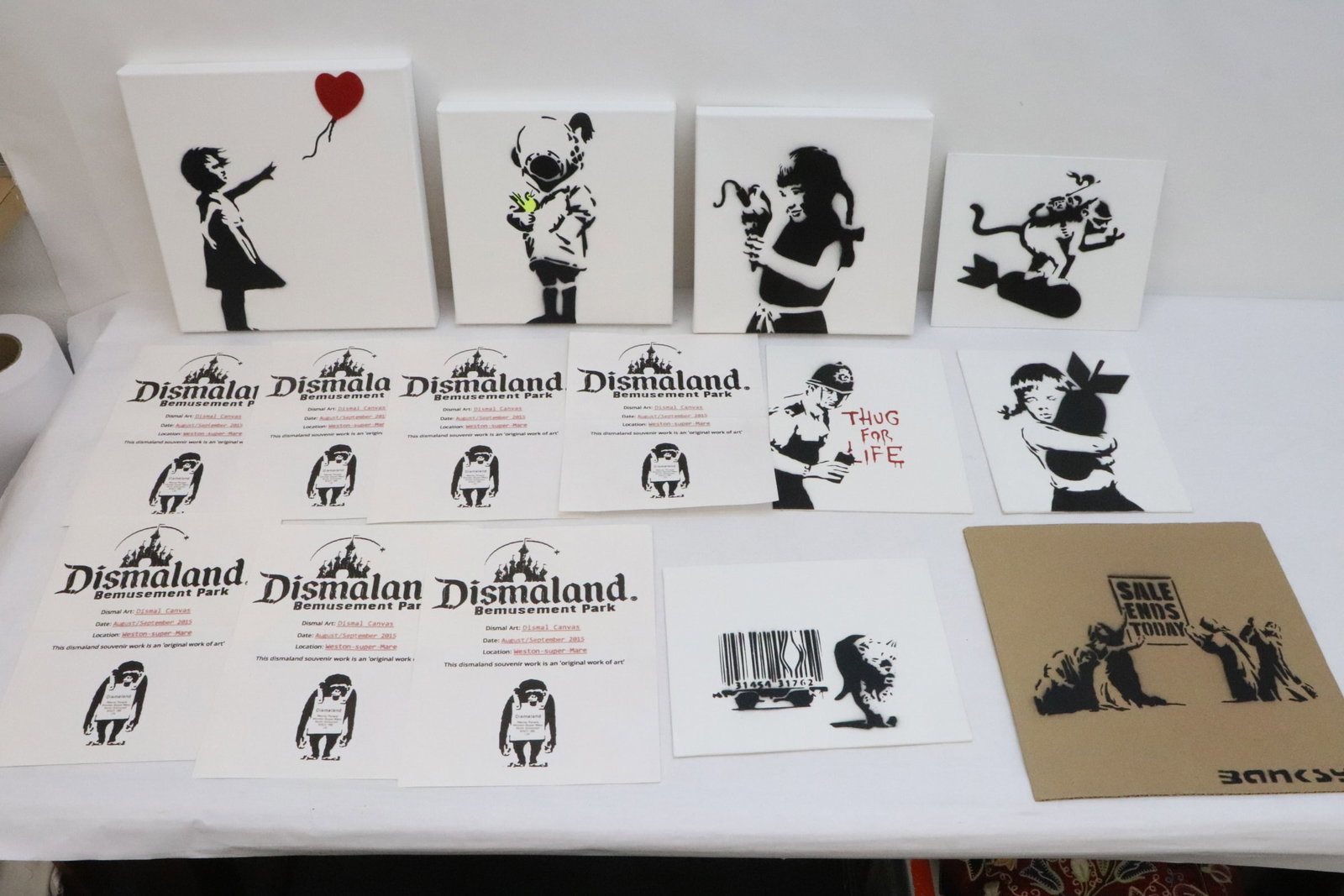 Lot of Banksy style art: Lot of Banksy style art, 10"x8" - 12"x12"