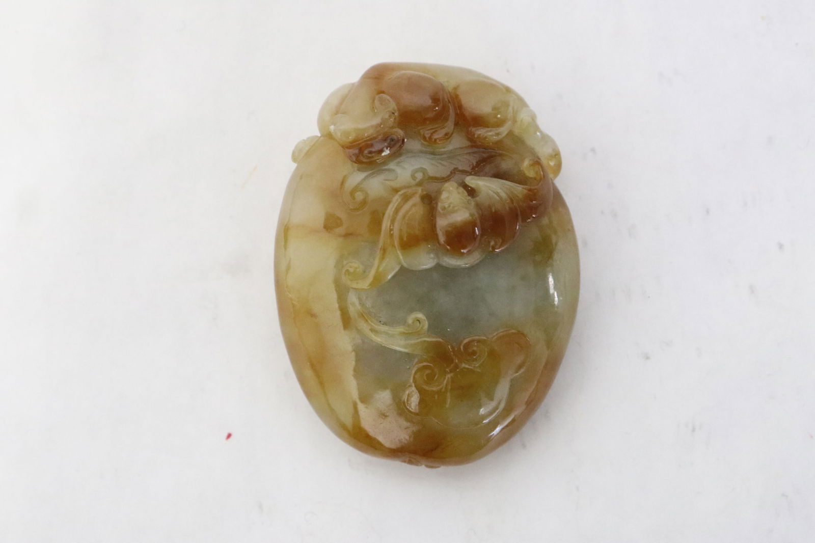 Fine jadeite/ agate carving: Fine jadeite/ agate carving depicting qilin and bat, 2.2"x1.65"x0.85"