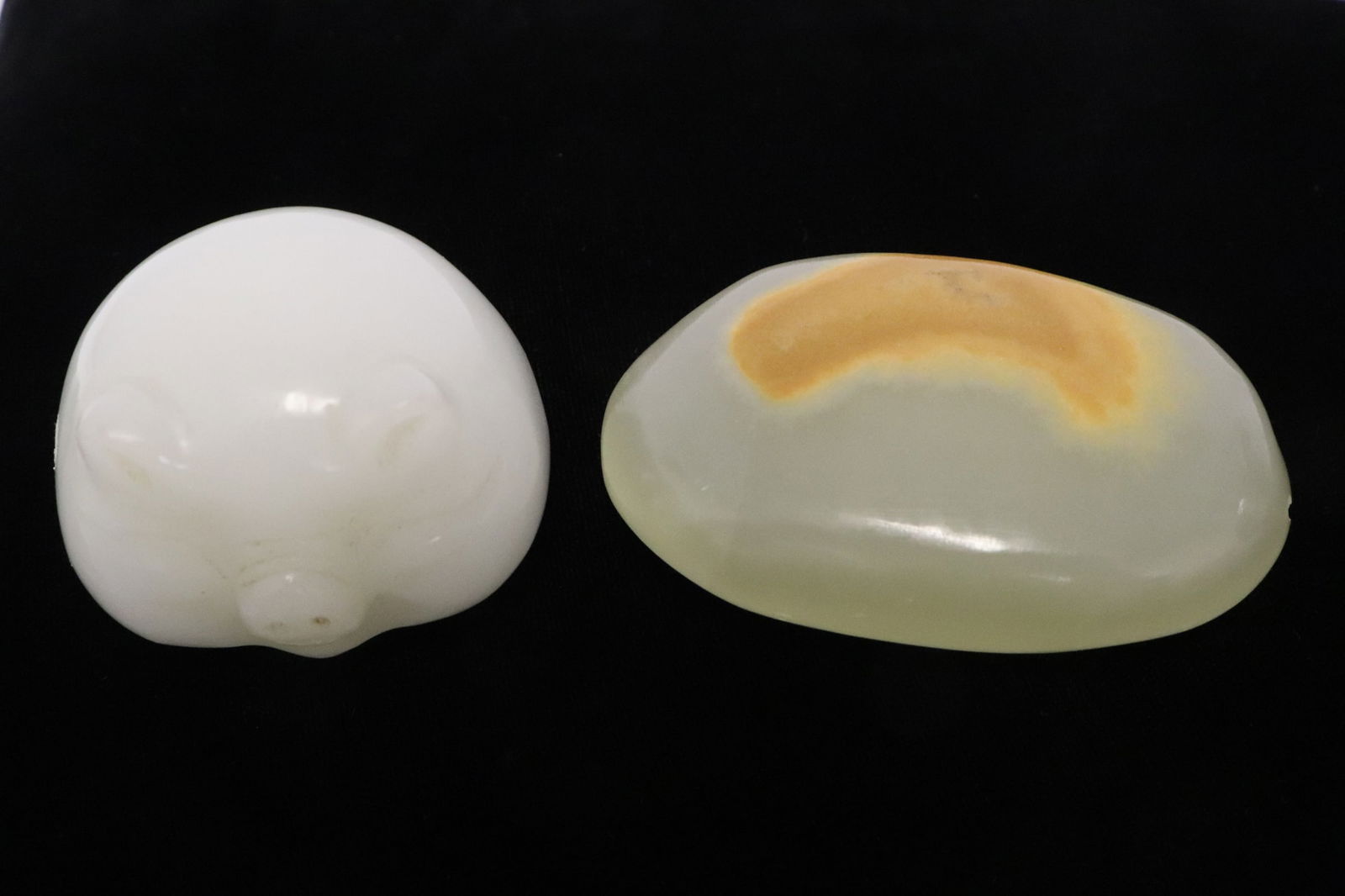 2 jade like pieces; a pig, and a stone (1 of 9)