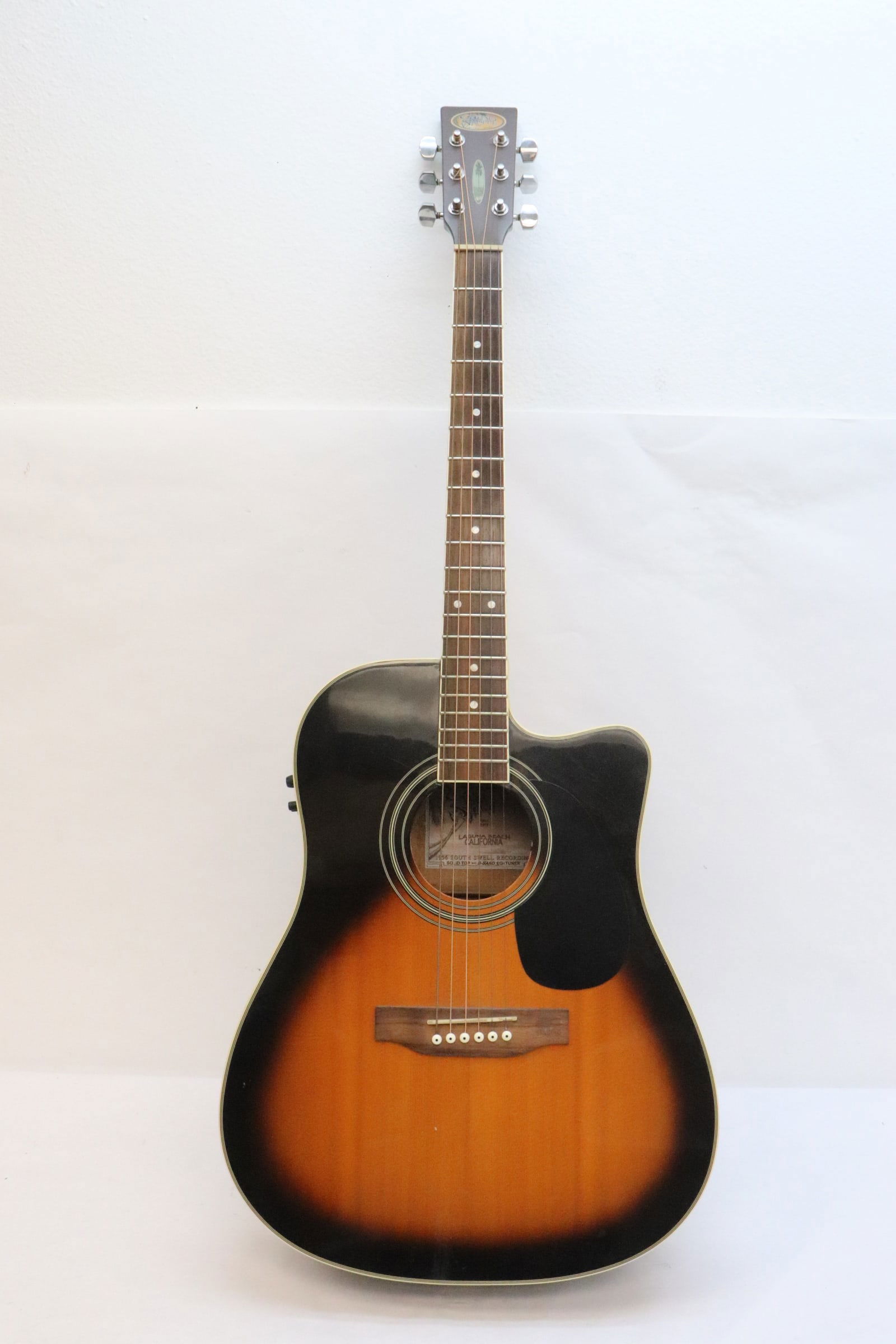 An acoustic guitar: An acoustic guitar, 40.5"L