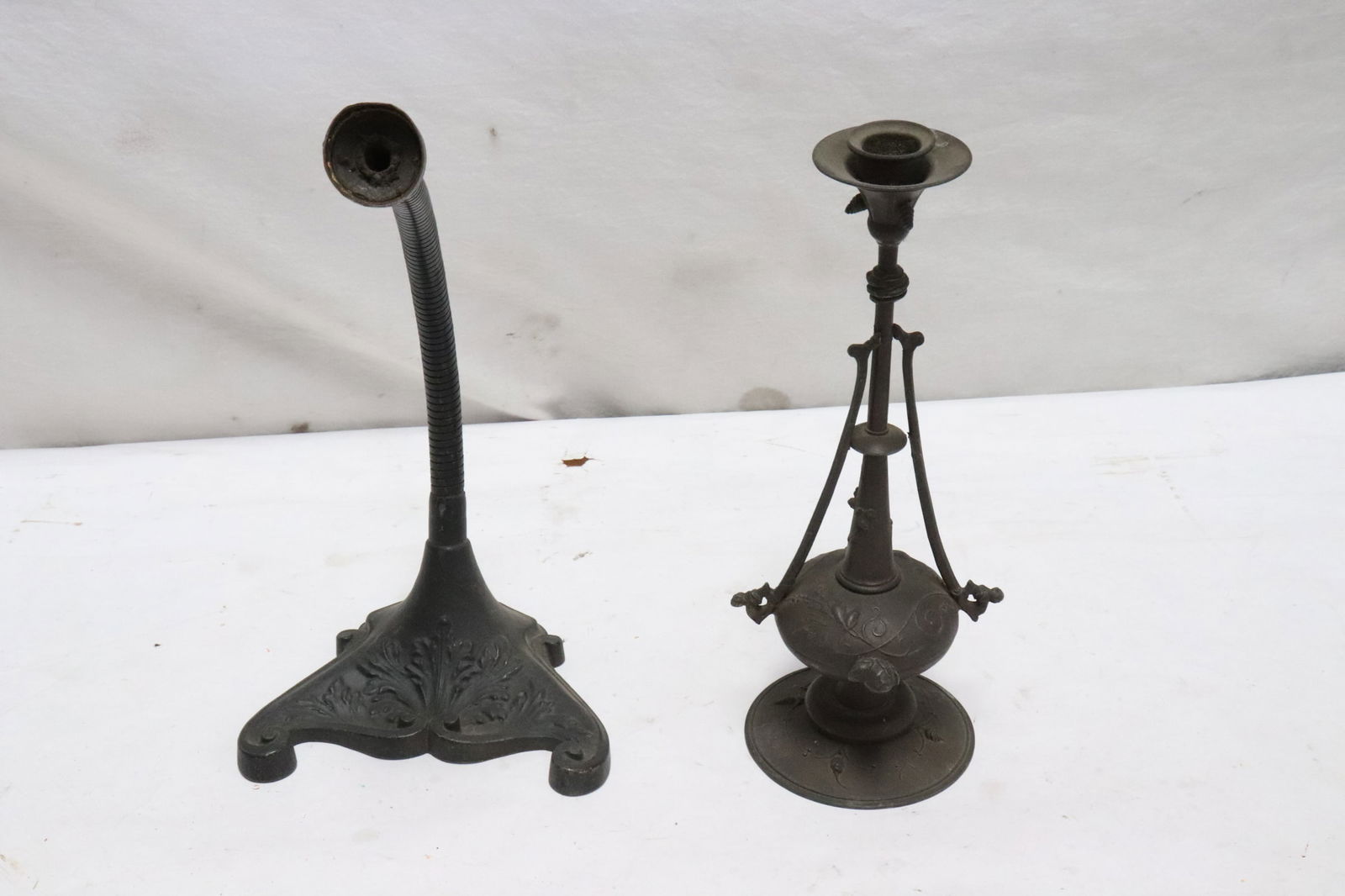 A cast lamp base, & a Victorian metal candle holder (1 of 10)