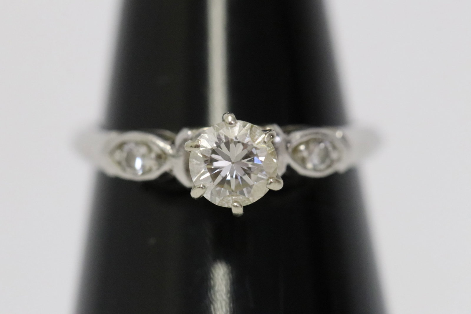 Fine platinum diamond ring: Fine platinum diamond ring, center a gem quality diamond wt. approx. 0.43ct in VS/ H quality, wt. 2.7gm, size 4.5