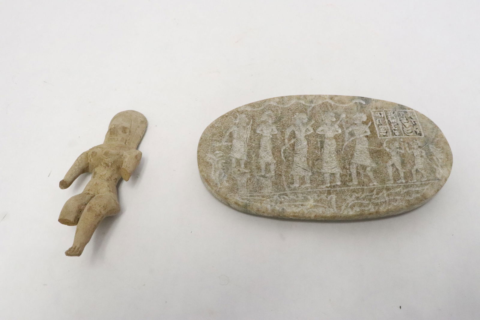 2 pieces: 2 pieces; Egyption stone panel (0.65"x5.22"x3.05"), and Egyption earthenware figure (damage) (4.16"H)