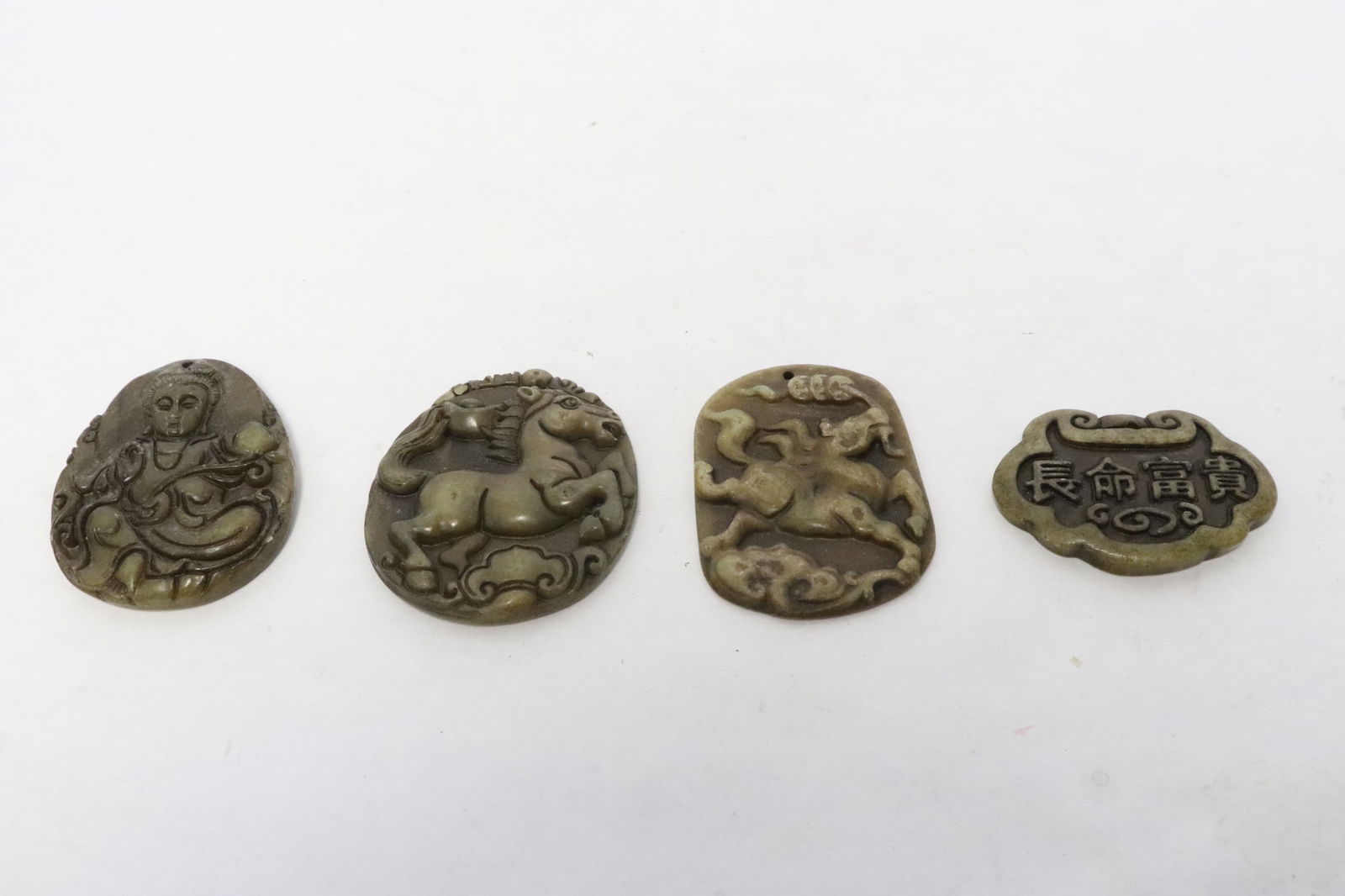 4 pieces jade like stone carved ornaments (1 of 9)