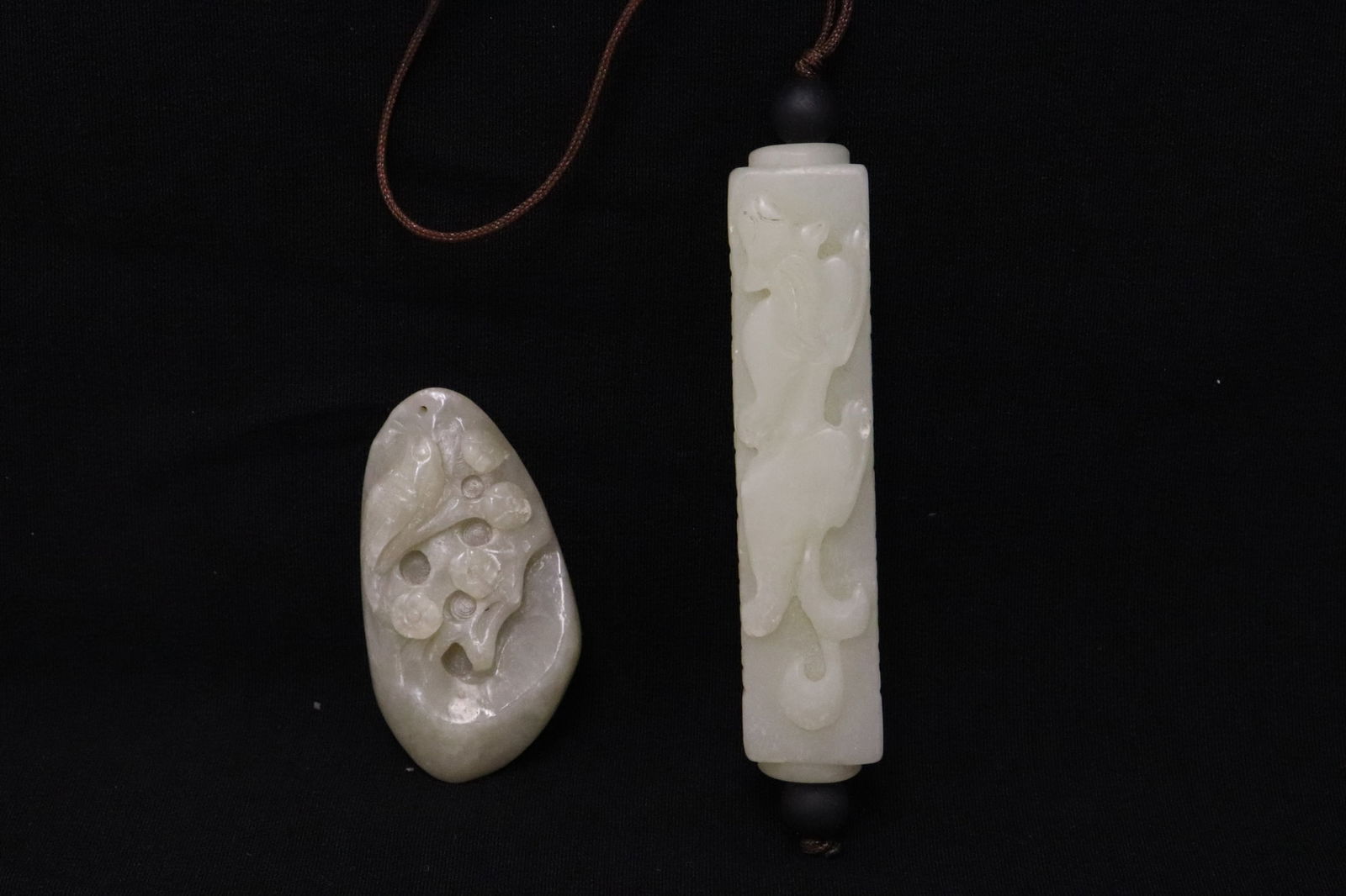 2 Chinese jade carved ornaments: 2 Chinese jade carved ornaments, 0.5"x2"x1.1", 0.63"x3.95"x0.75"