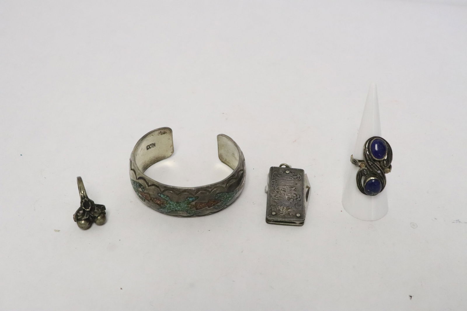 sterling cuff, 2 sterling rings, & a sterling cased knife (1 of 10)