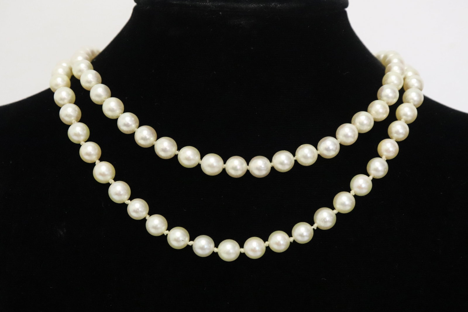 cultured pearl choker w/ sterling silver clasp: double strand cultured pearl choker with sterling silver clasp, each pearl measures approx. 7mm diameter