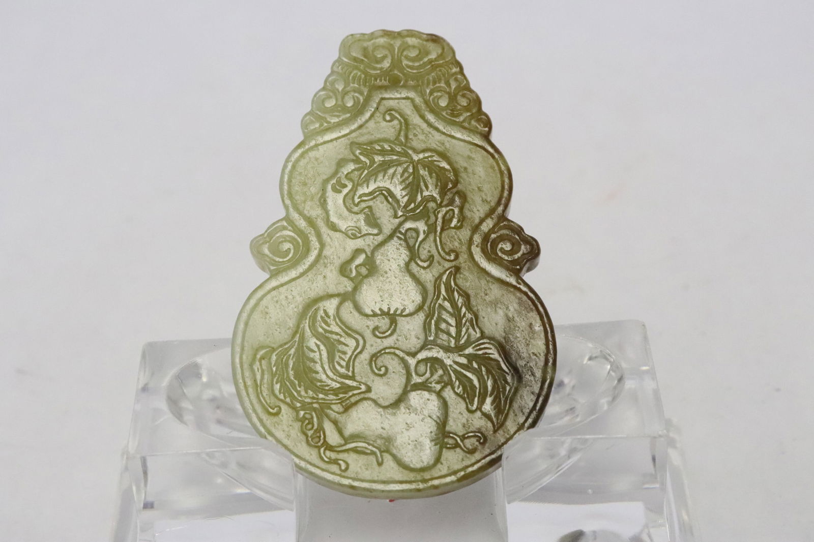 Celadon jade carved ornament: Celadon jade carved ornament, 0.3"x2.96"x1.96"