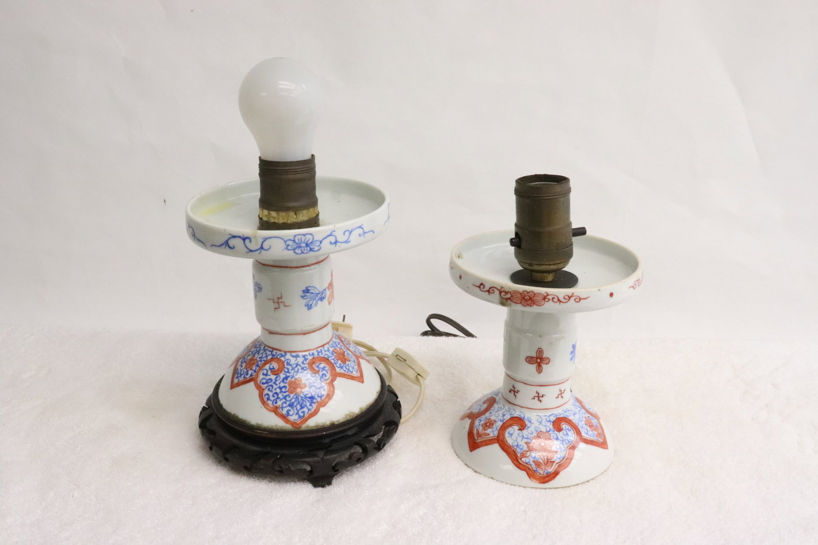 Pr Chinese vintage porcelain candle holders, made as lamps: Pair Chinese vintage famille rose porcelain candle holders (0ne top edge chip), made as lamps, 6.9"H ea