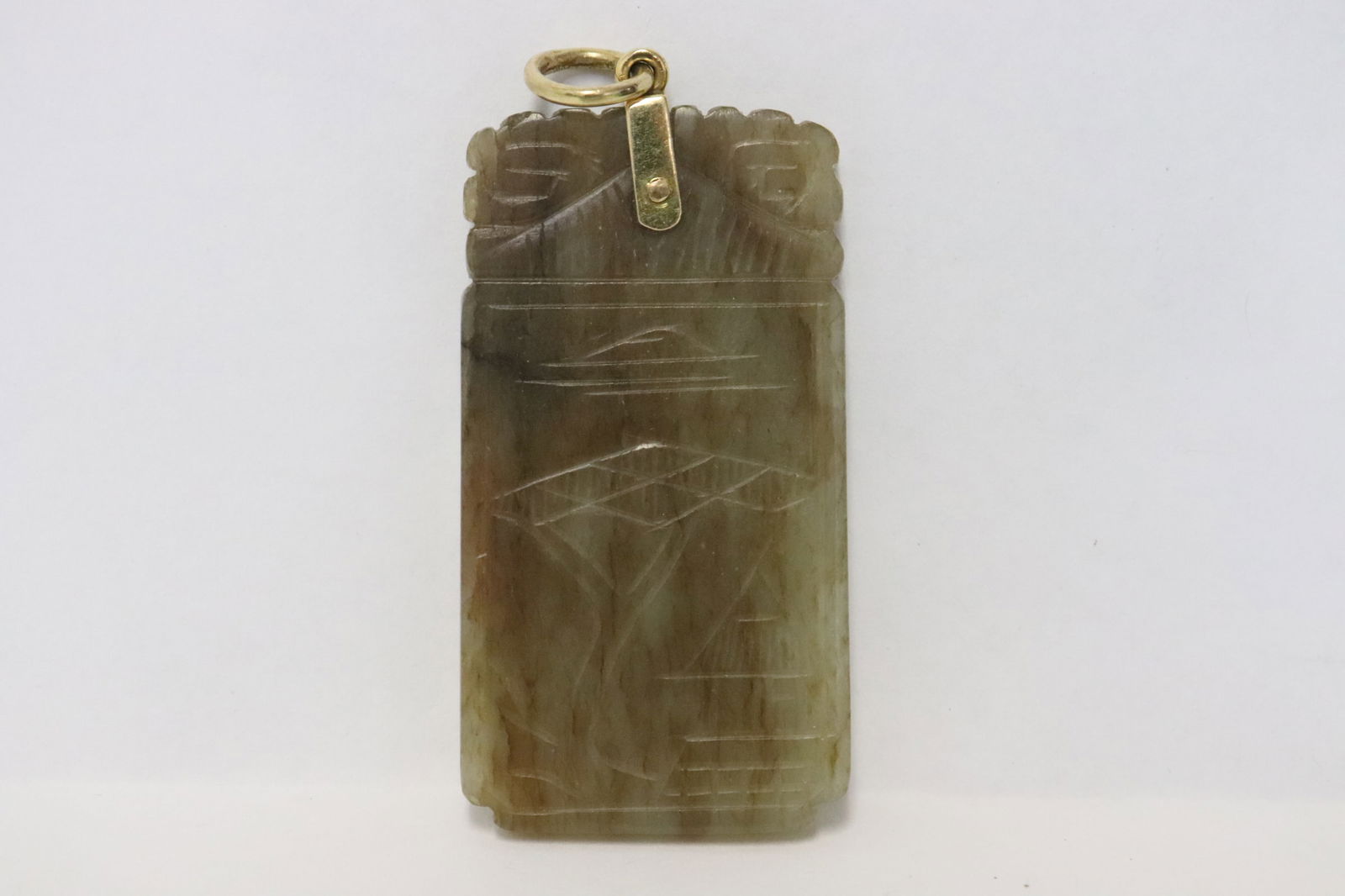 Chinese 19th/20th c. jade plaque w/ 18K bale: Chinese 19th/20th century celadon jade rectangular plaque attached to an 18K Y/G bale to make as pendant (2.2"x1.25"x0.35")