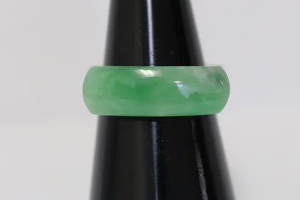 An apple green jadeite saddle ring