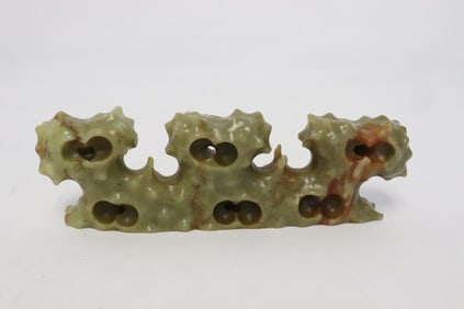 A celadon jade carved brush mountain