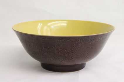 A brown glazed porcelain bowl