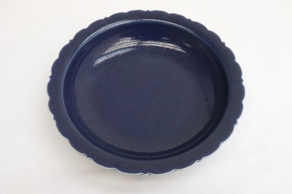 A blue glazed porcelain plate