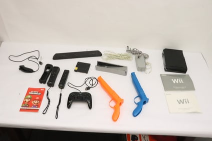 The WII console, model RVL 001 and accessories