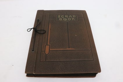 Scrapbook of 1930's newspaper clips, postcards, etc