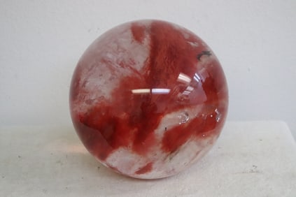 A massive crystal ball, impact bruises